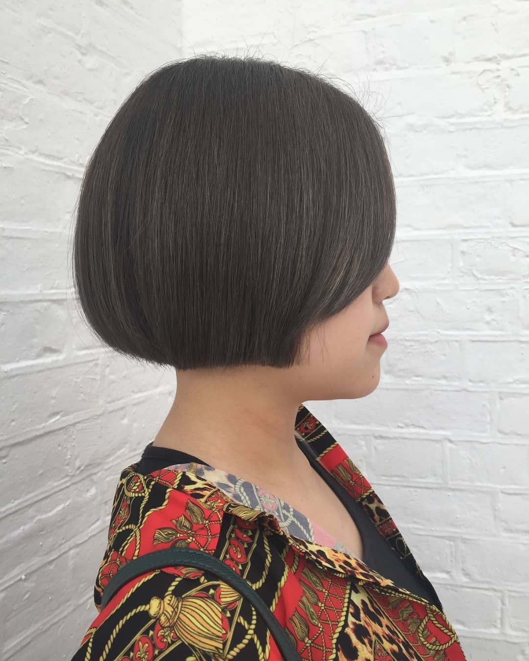 Sleek bob with side bangs