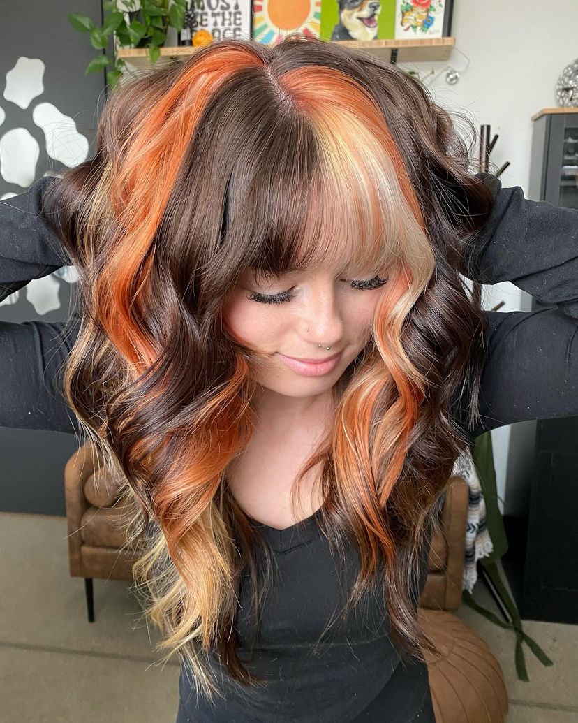 2025-hair-trends-1 Beautiful calico hair color on long wavy hair.