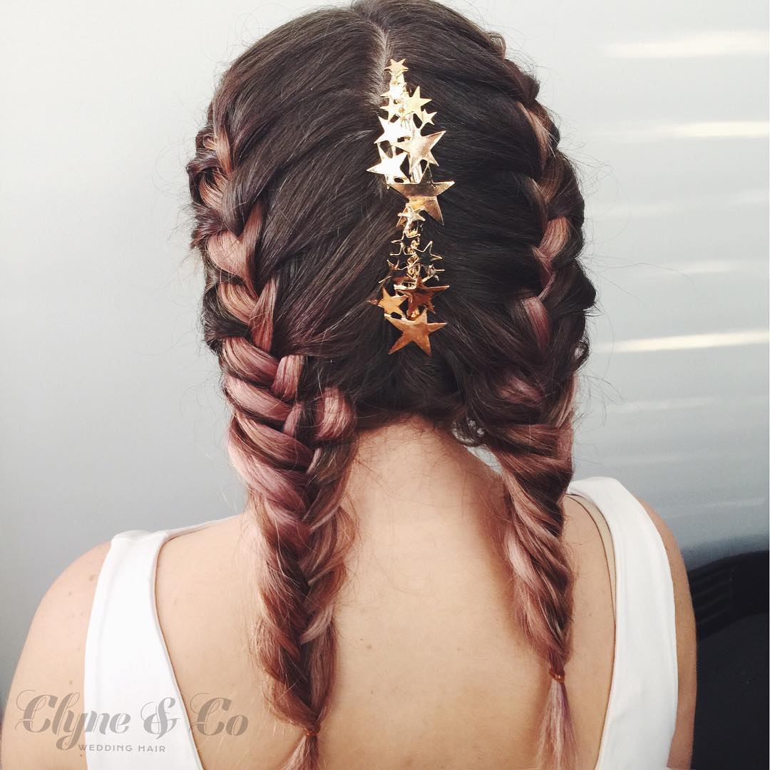 23-boxer-braids Two tight boxer braids with glitter applied to the roots along the part.