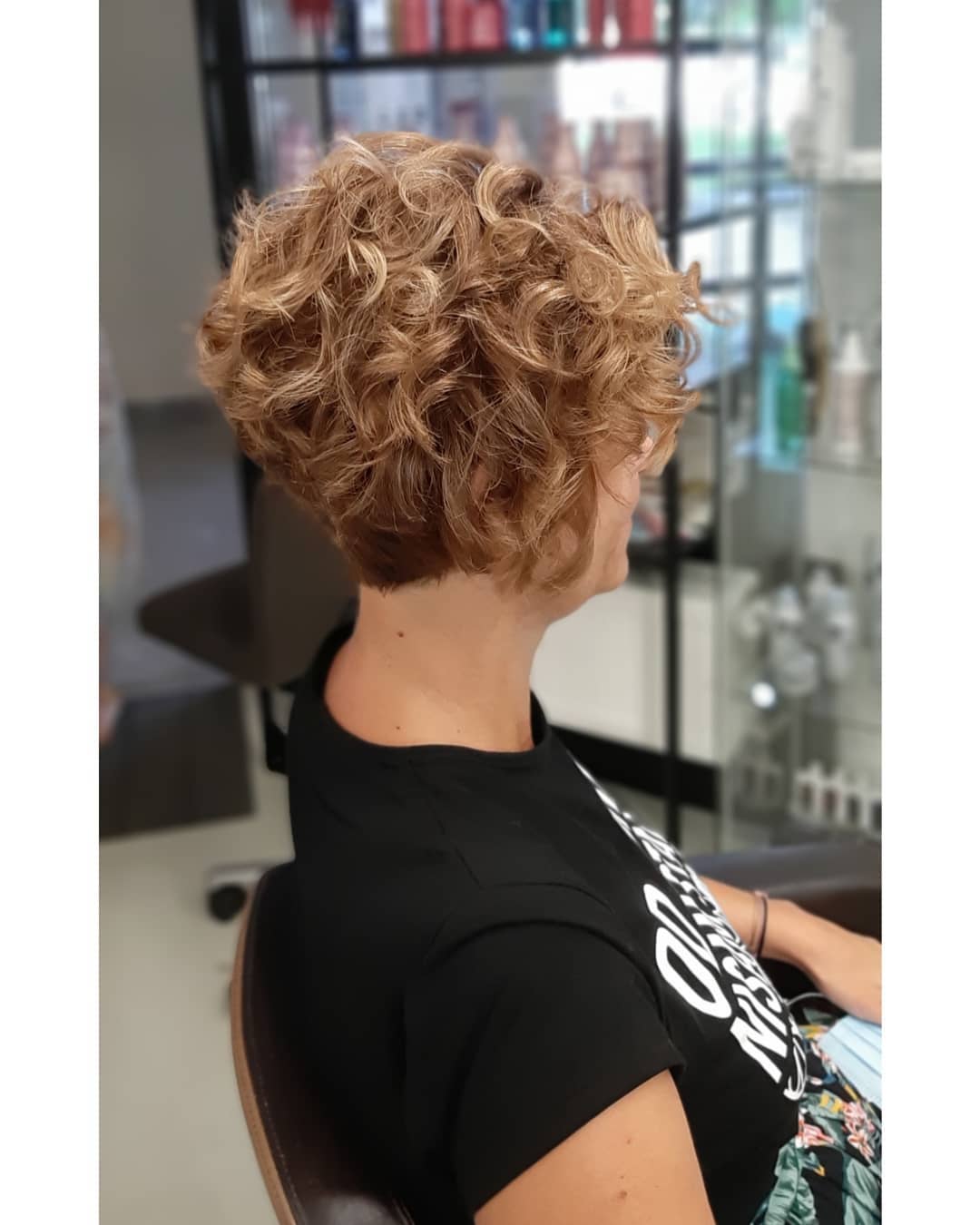 Pixie cut with curls on top