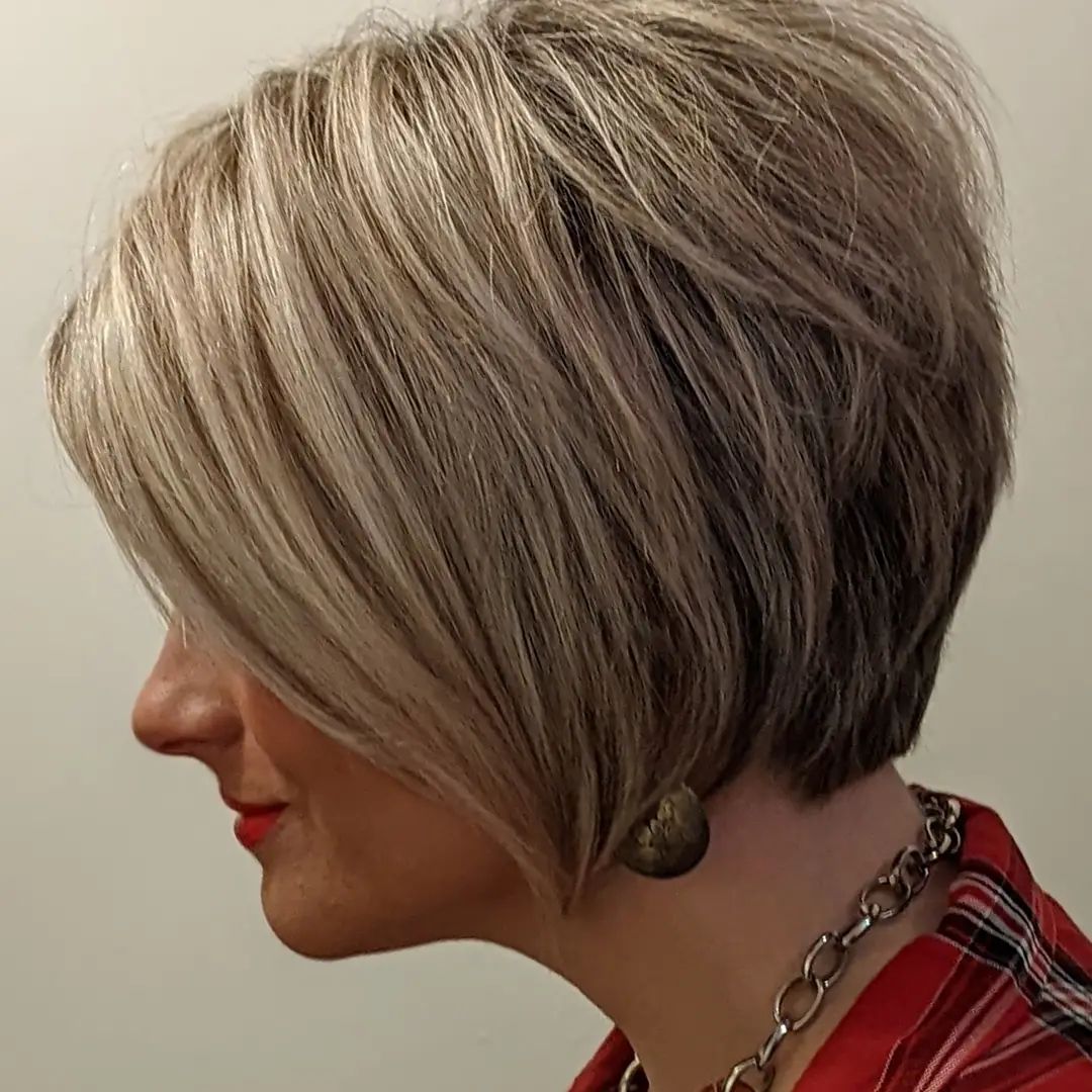 Medium-length blonde bixie haircut