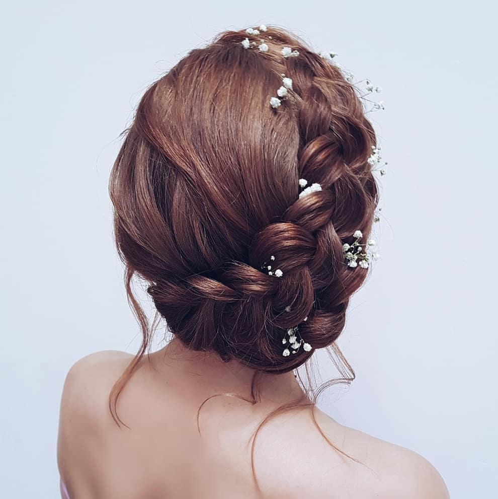 40-wrapped-braid A dutch braid wrapped up one side of the head like a headband.