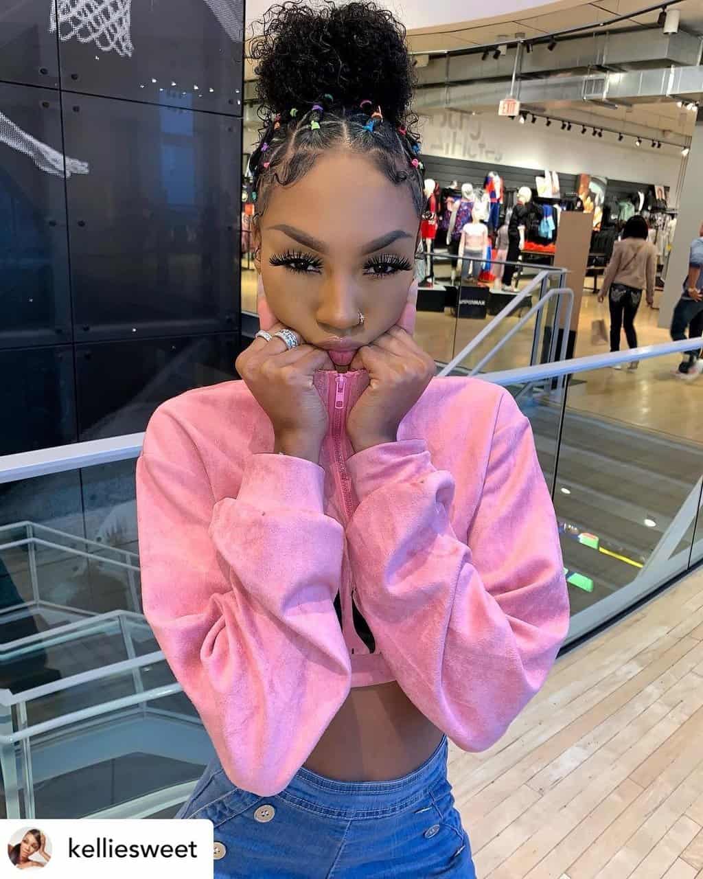 Instagram baddie with rubberband hairstyles.