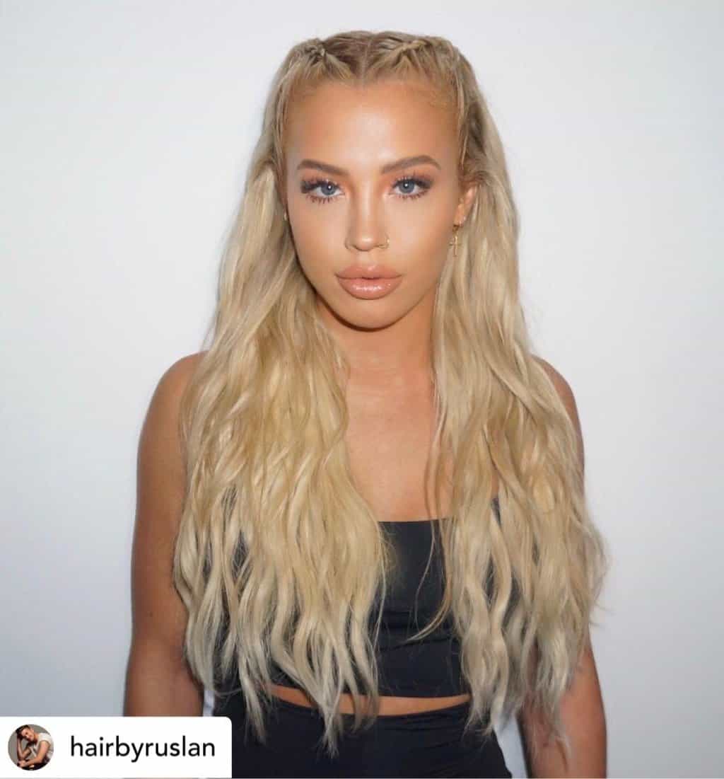 Instagram baddie with accent braids.