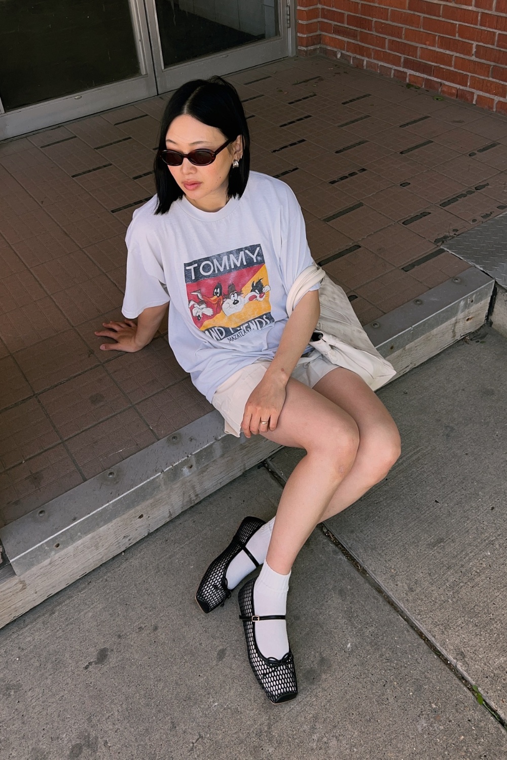 ballet-flats-outfits-13 Graphic Tee and Denim Shorts