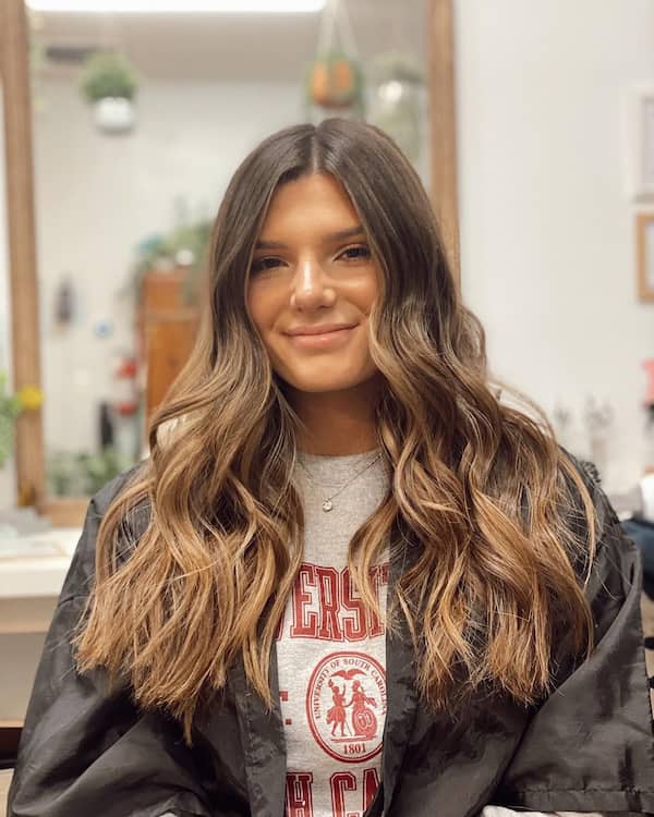 centre-parted-layered-wavy-hair Centre-Parted Layered Wavy Hair