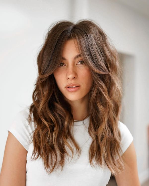 classic-haircut-with-internal-layers-and-curtain-bangs Classic Haircut with Internal Layers and Curtain Bangs