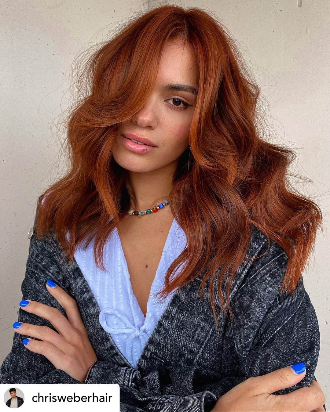 Copper penny hair color on beautiful woman.