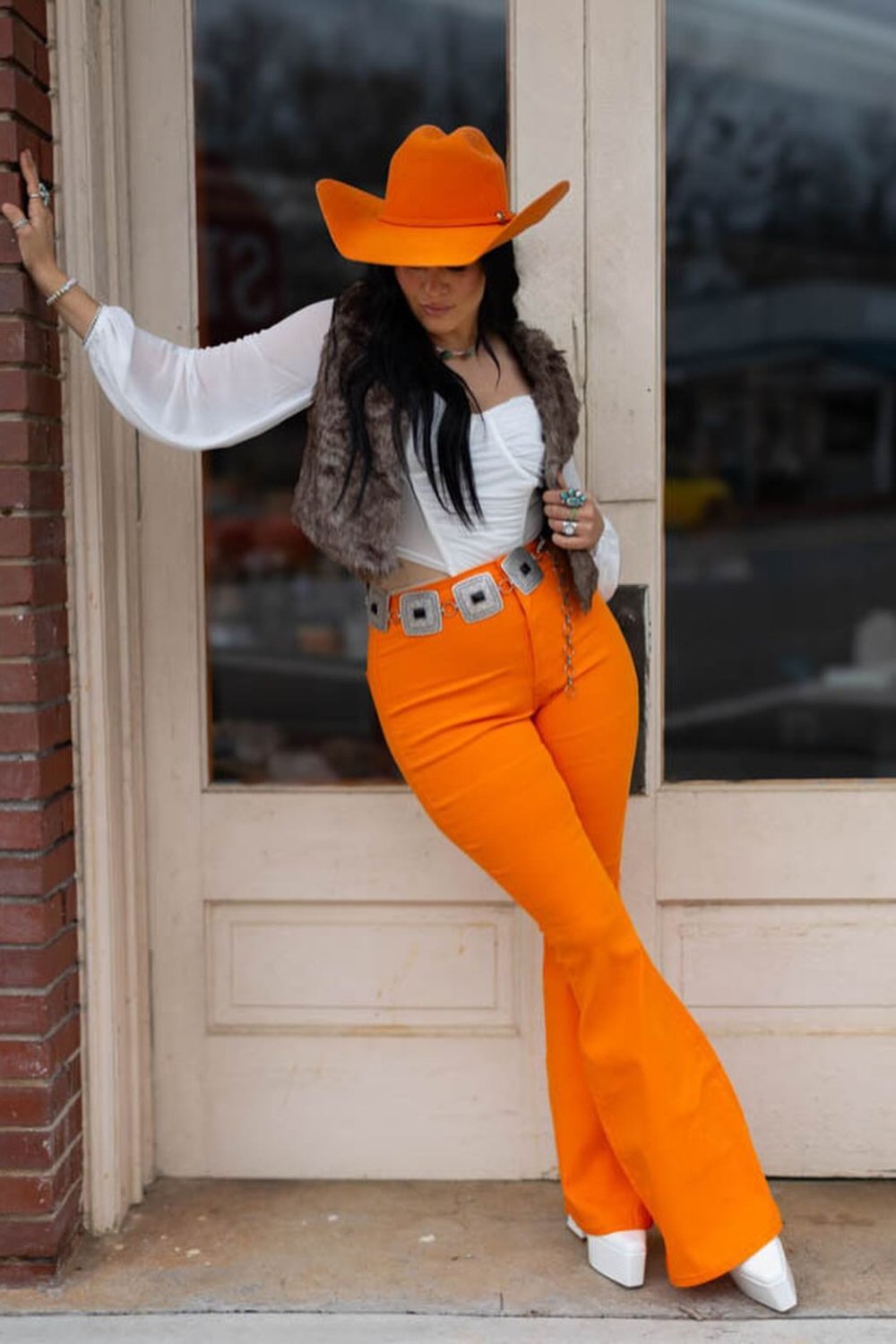 cowgirl-outfits-10 White Bell Sleeves & Orange Cowboy Hat