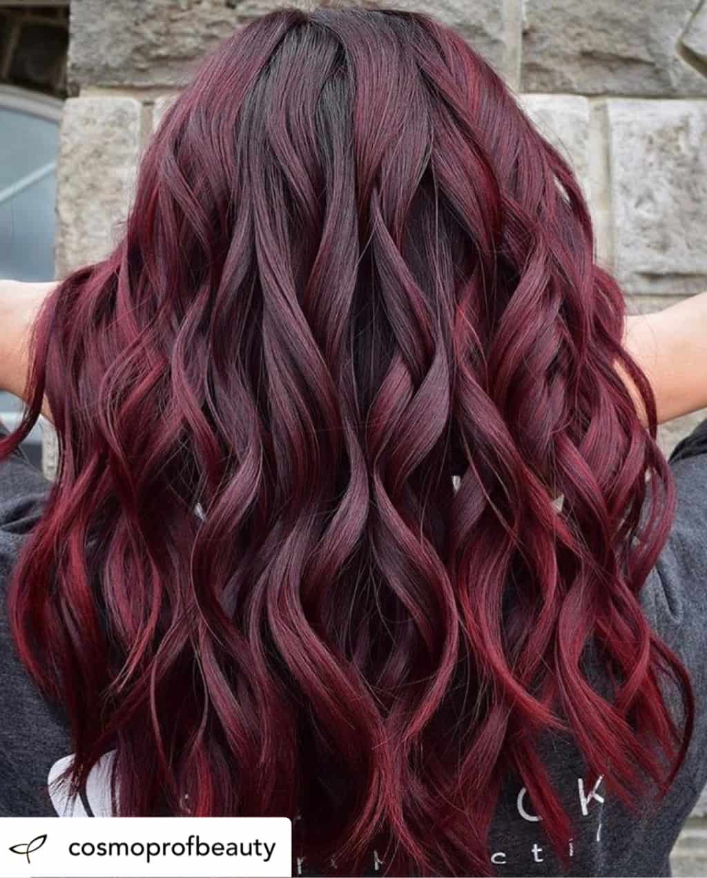 Woman with beautiful mulled wine hair color.