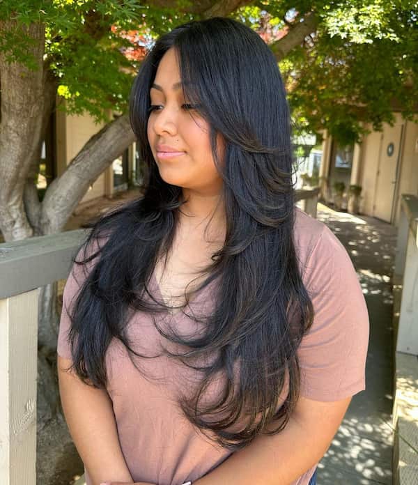 Glam Butterfly Haircut with Curtain Bangs And Face Framing Layers