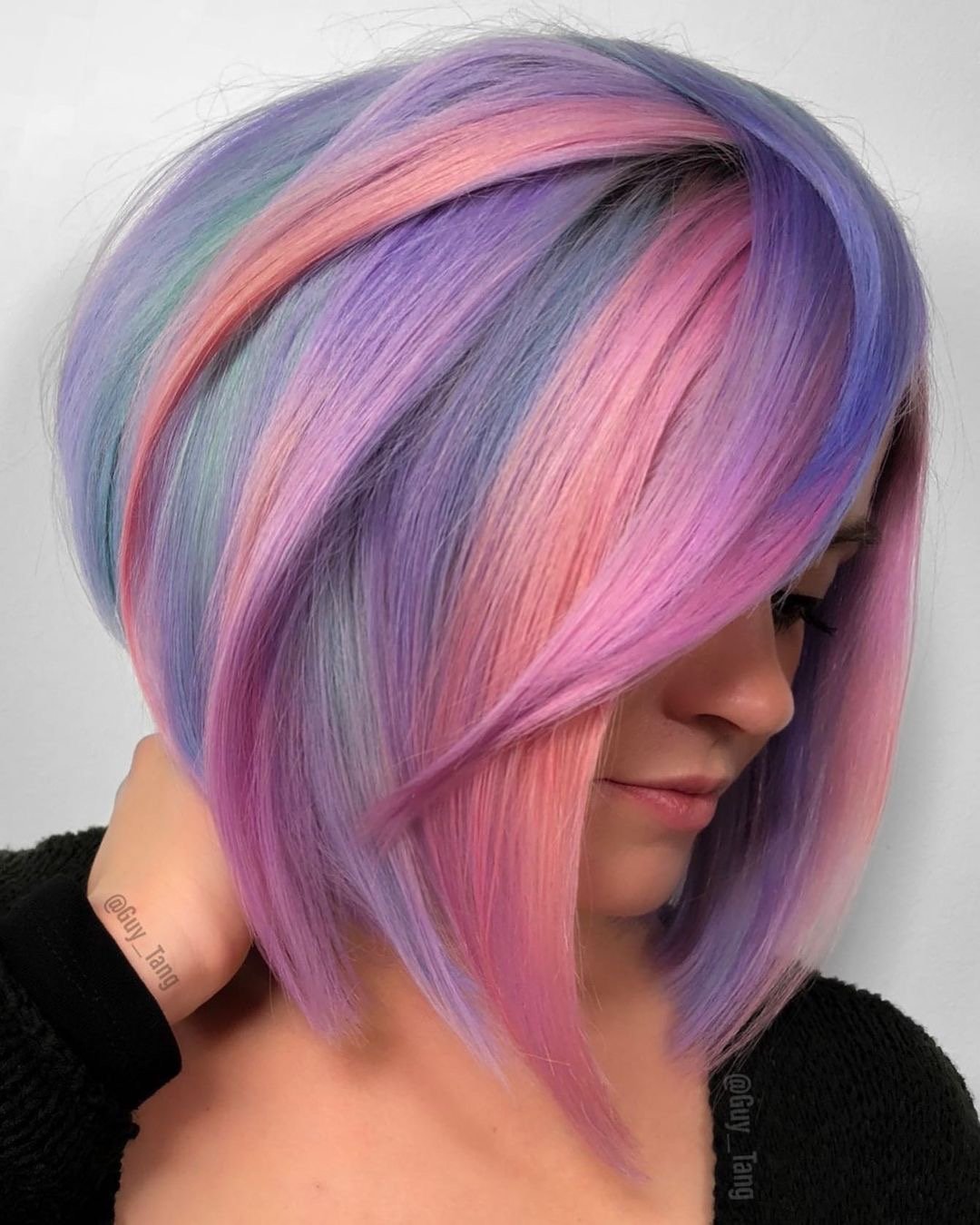 Beautiful pastel hair color on short bob haircut.