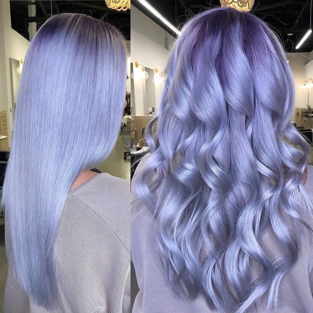 Beautiful smokey lilac hair color on long hair.
