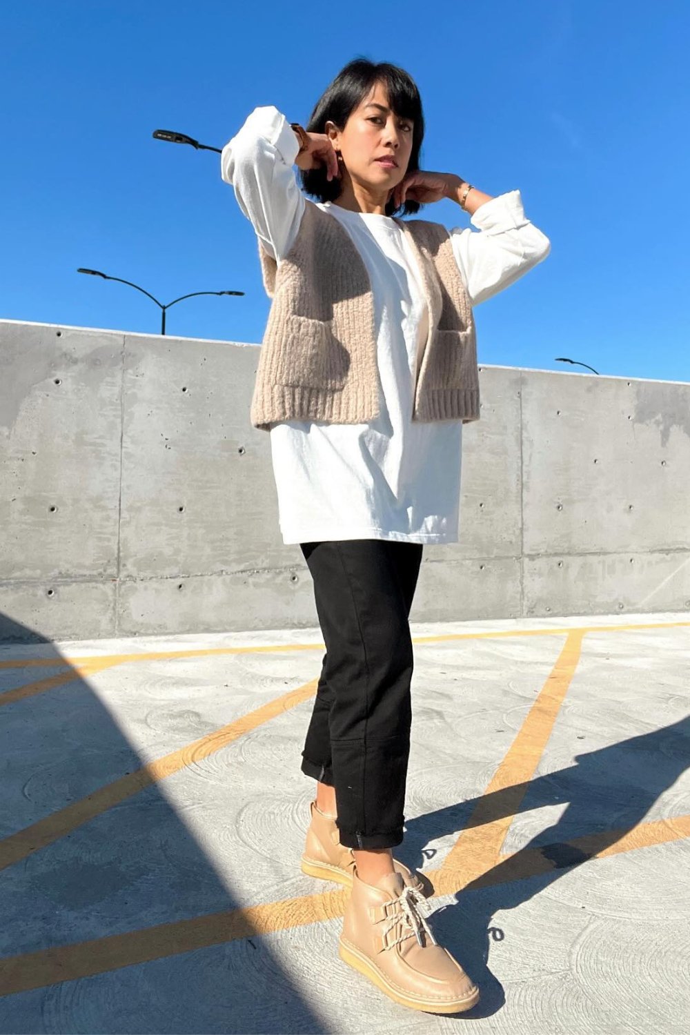 grandpa-core-outfits-16 Knit Vest, Oversized Tee, and Cropped Pants