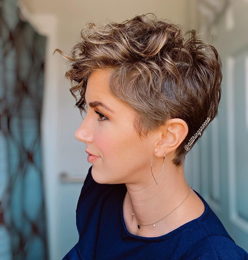 Woman with cute curly pixie haircut on short hair. Find out what hairstyles are best for every hair type.
