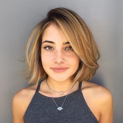 Woman with gorgeous short bob haircut on fine hair. Find out what hairstyles are best for every hair type.