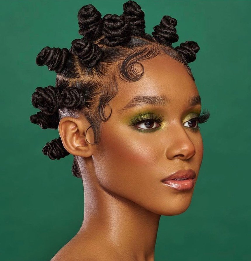 Gorgeous woman with bantu knots. Find out what hairstyles are best for every hair type.