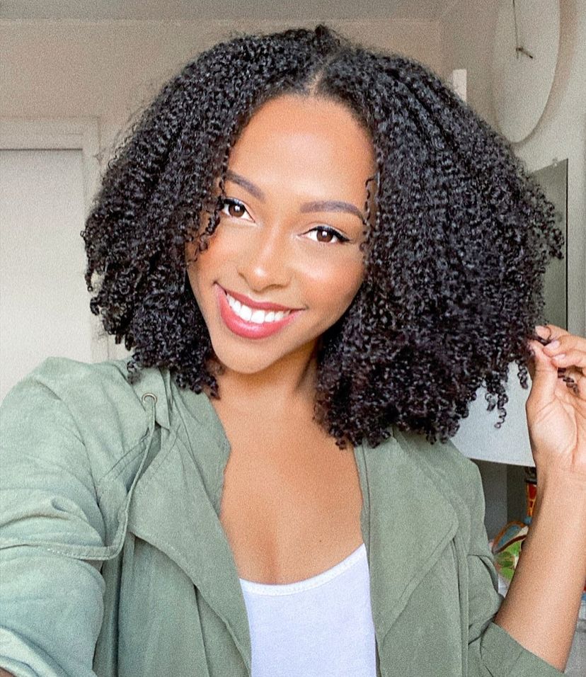 Gorgeous woman with naturally curly hair. Find out what hairstyles are best for every hair type.