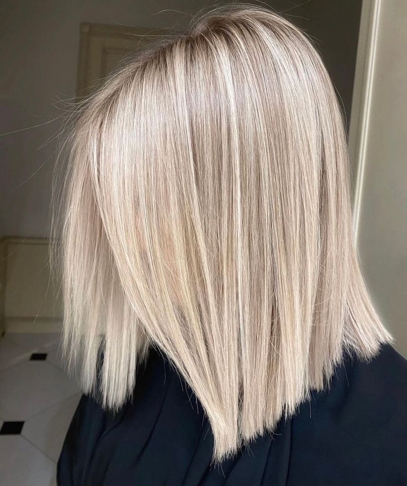 Woman with cute long bob haircut on blonde hair. Find out what hairstyles are best for every hair type.
