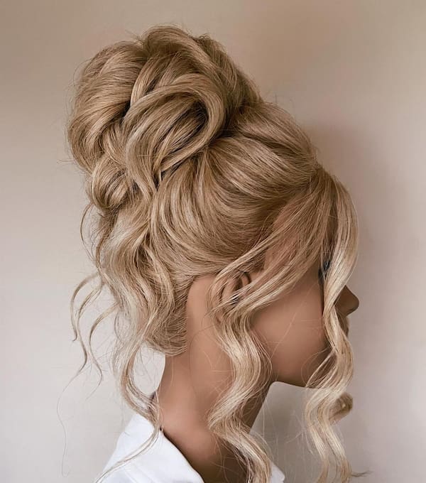 high-stepped-updo-with-frontal-bangs High Stepped Updo with Frontal Bangs