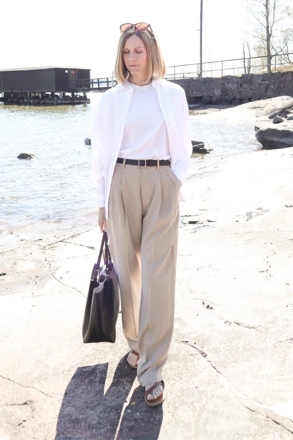 how-to-wear-a-white-button-down-shirt-19 Open Shirt over White Tee with Beige Trousers