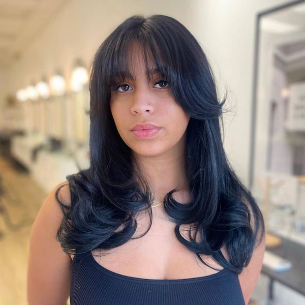 Layered Haircut with Wispy Bangs