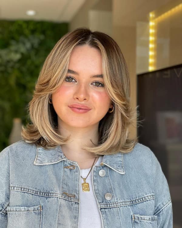 Layered Long Bob with Curtain Bangs and Feathered Ends