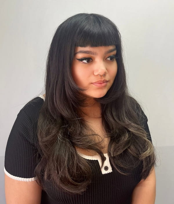 Long Layered Haircut with Baby Bangs