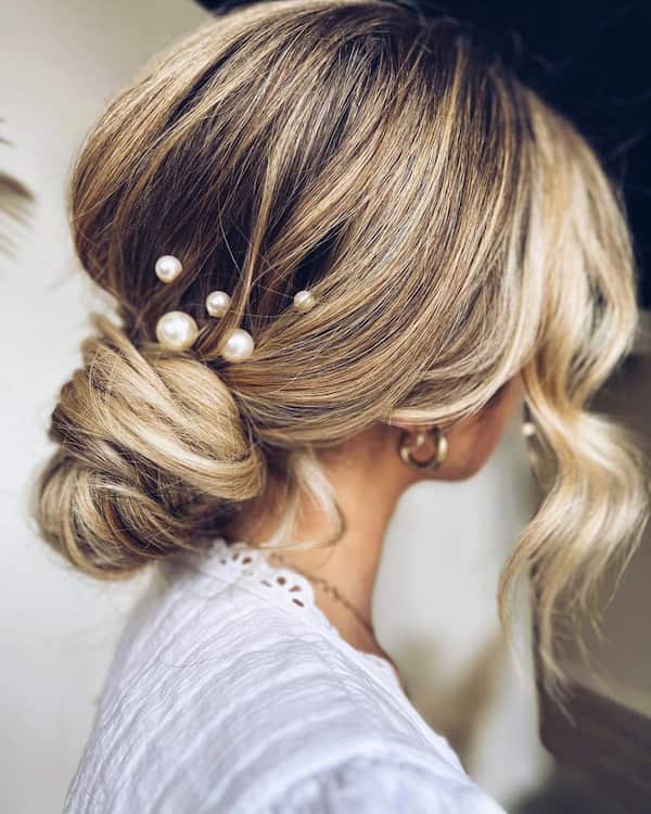 low-chignon-with-front-bangs Low Chignon with Front Bangs