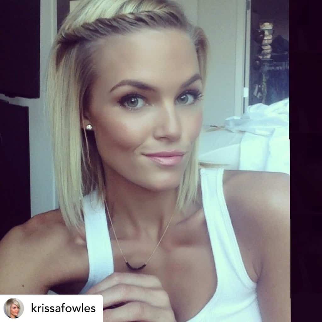 Beautiful woman with twist bangs on medium-length hair.