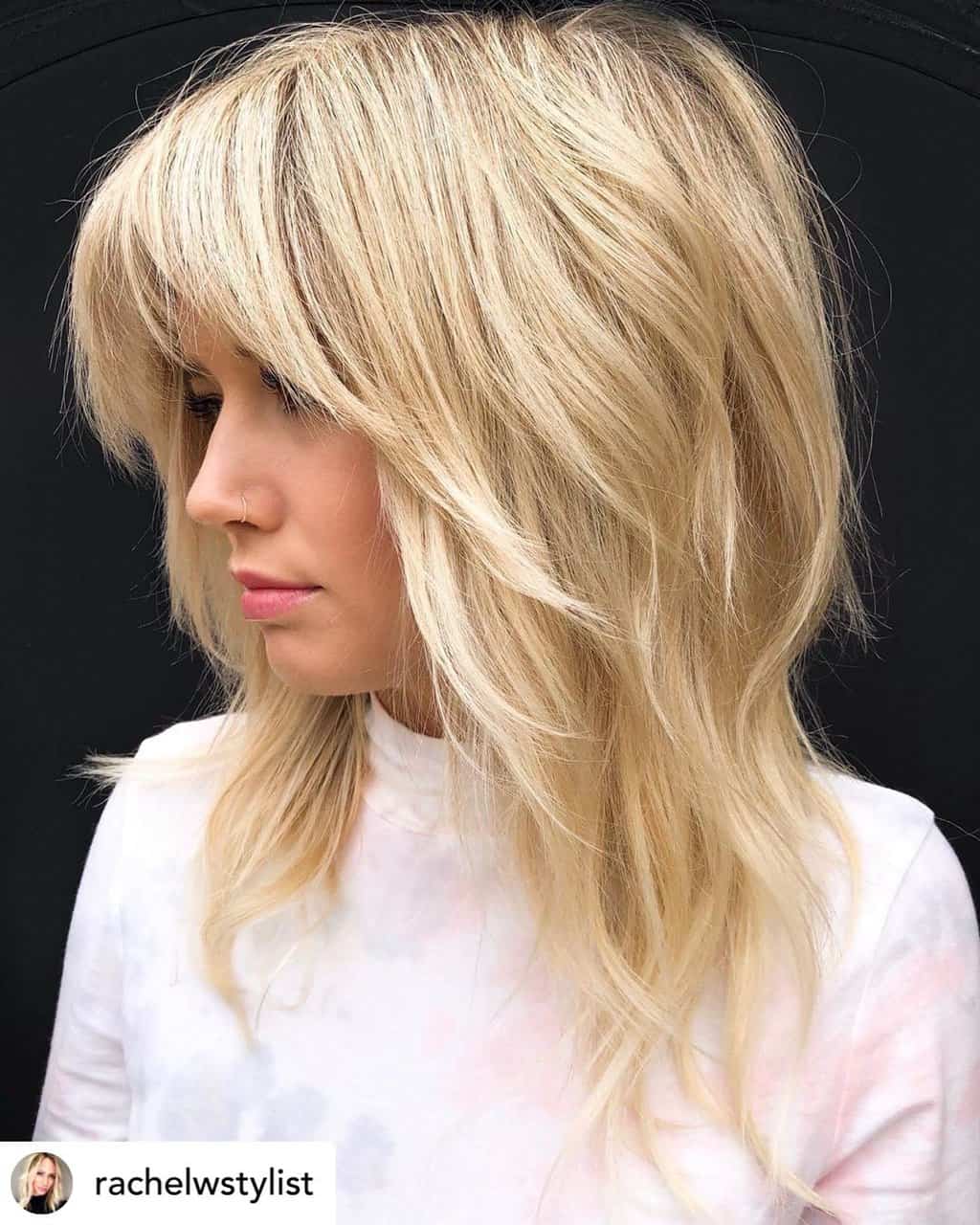 Sexy modern shag haircut on medium-length hair.