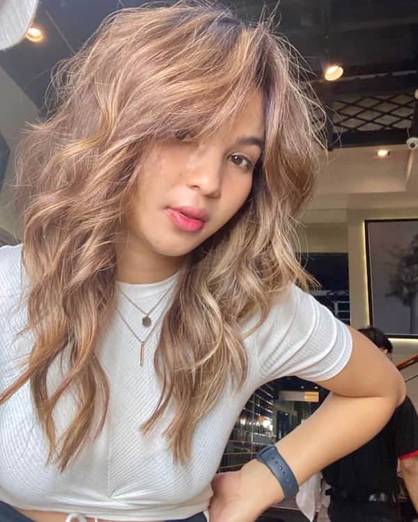 Messy Shag Haircut with Feathered Layers