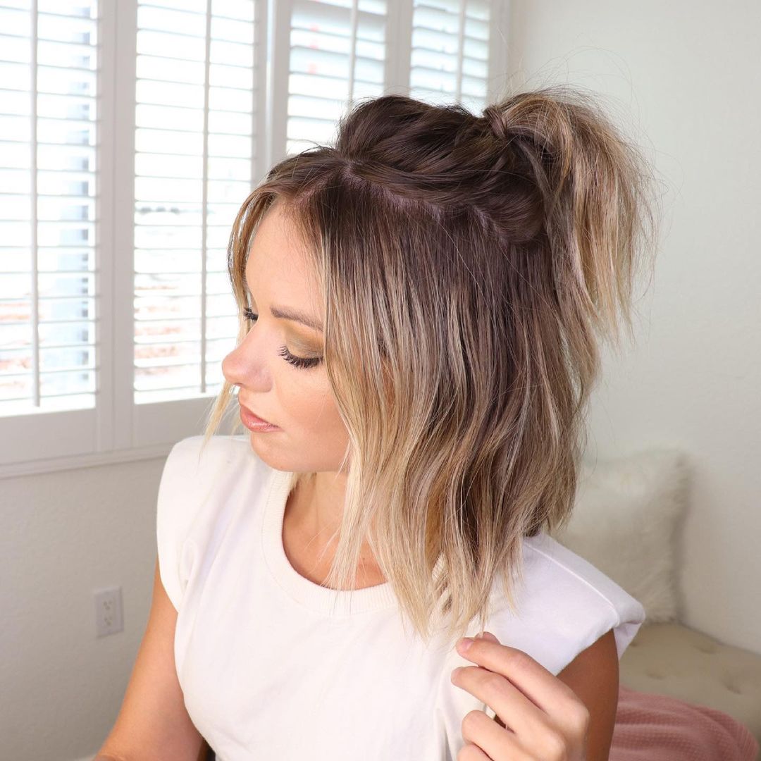 Gorgeous woman with half up half down hairstyle.