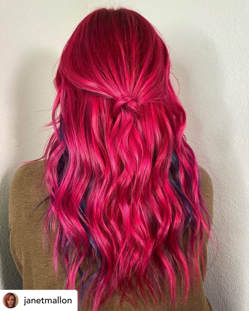 Vibrant raspberry red hair.