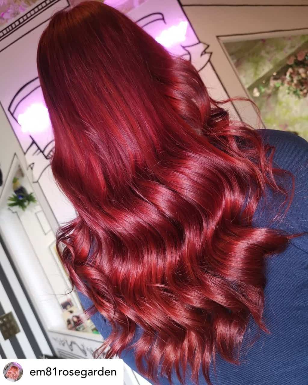 Vibrant cherry red hair.