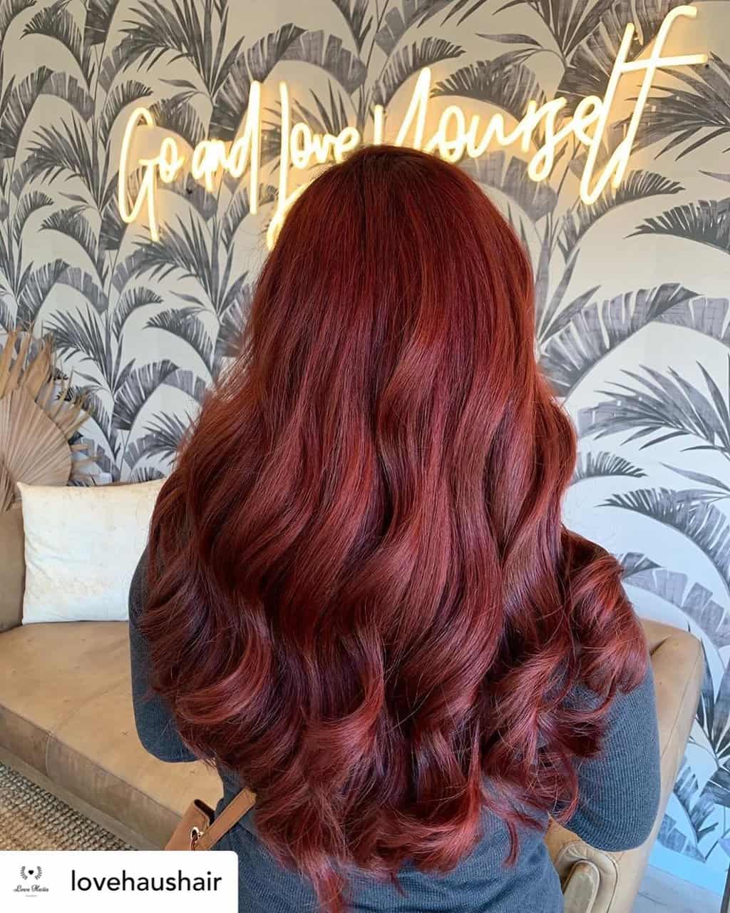 Vibrant mahogany red hair.