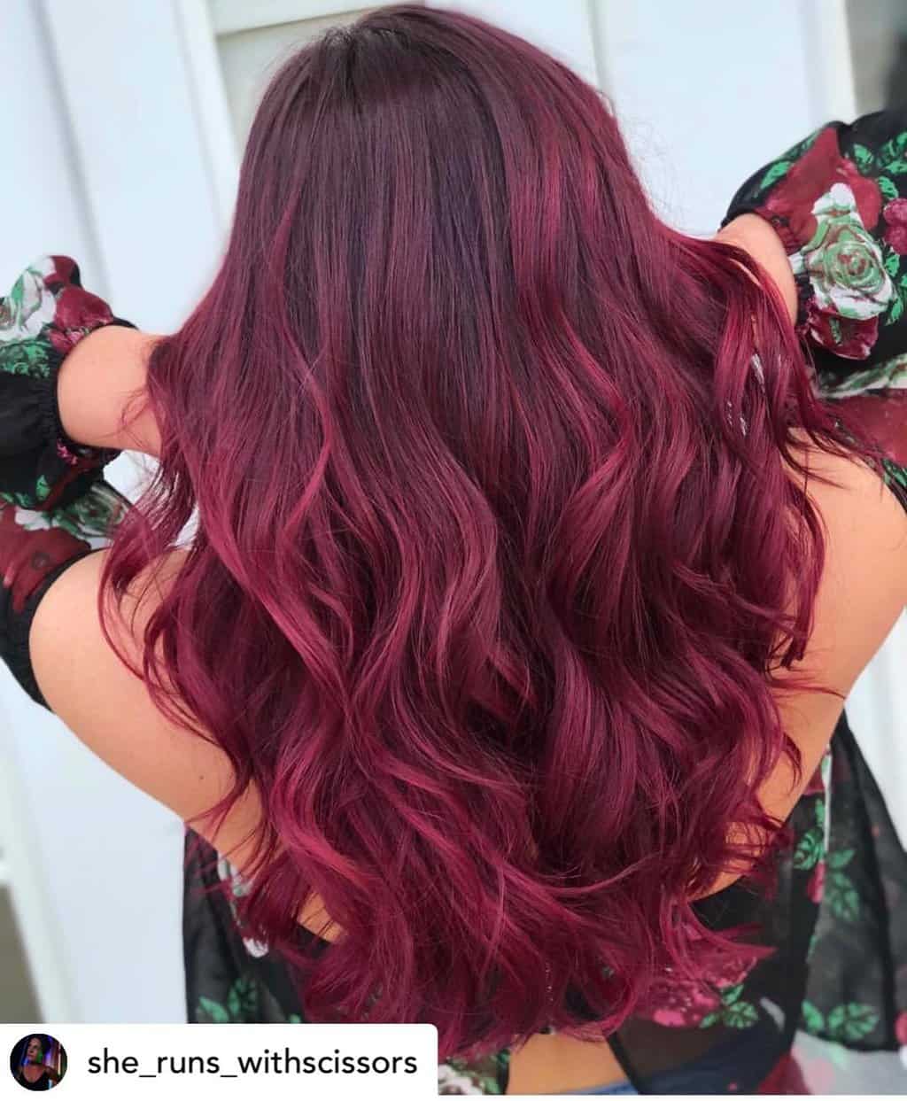 Vibrant maroon red hair.