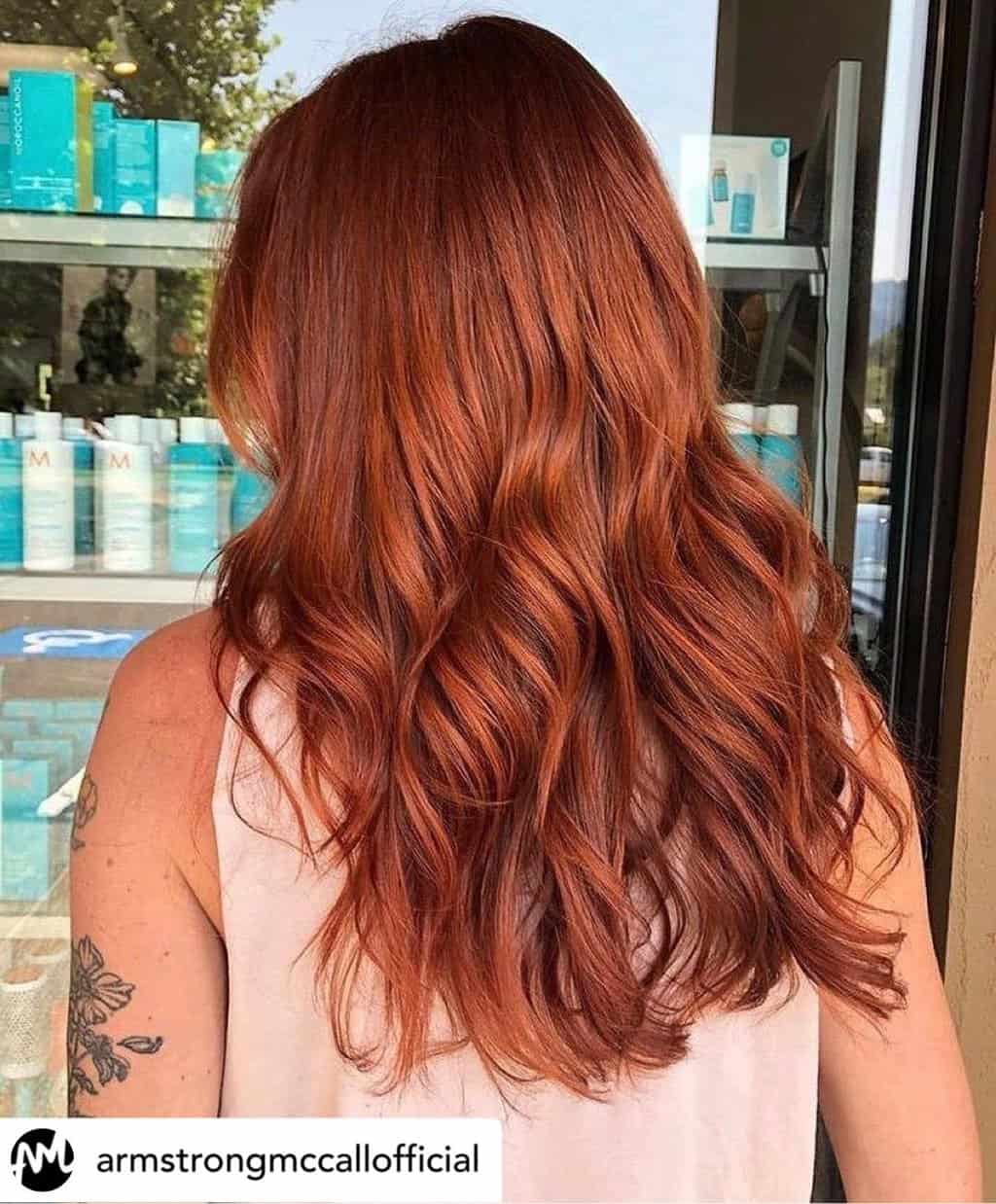 Vibrant auburn red hair.