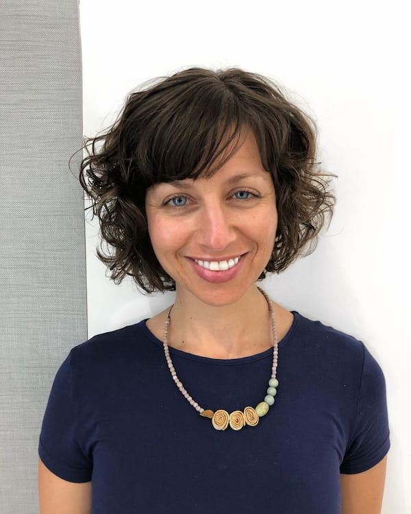 Short Wavy Haircut with Bangs