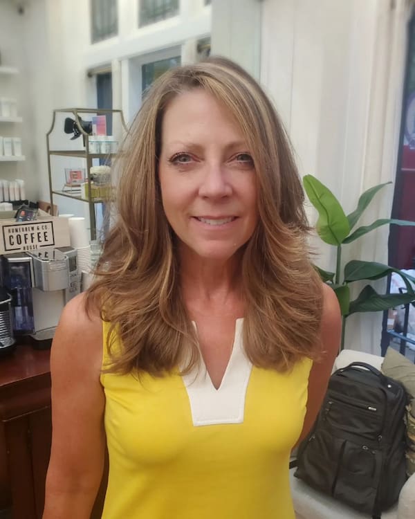 Side-parted haircut with Feathered Layers