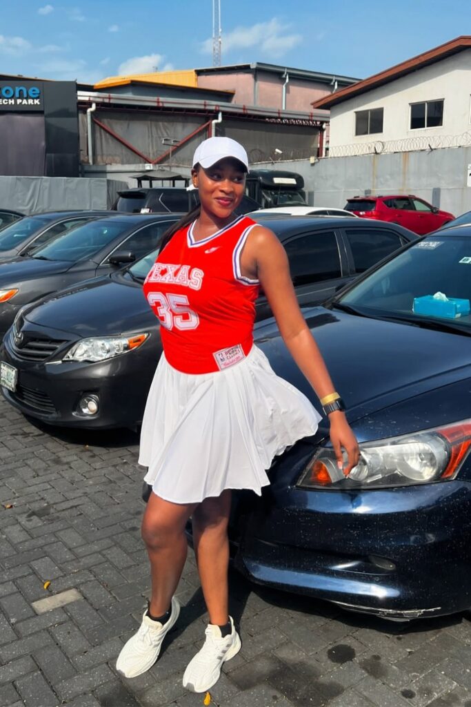 Basketball Jersey and Pleated Skirt