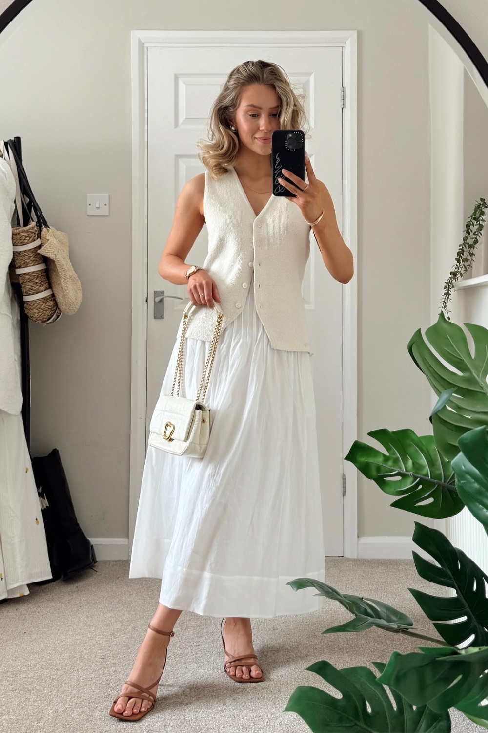 spring-outfits-23 Chic Knit Vest and Midi Skirt