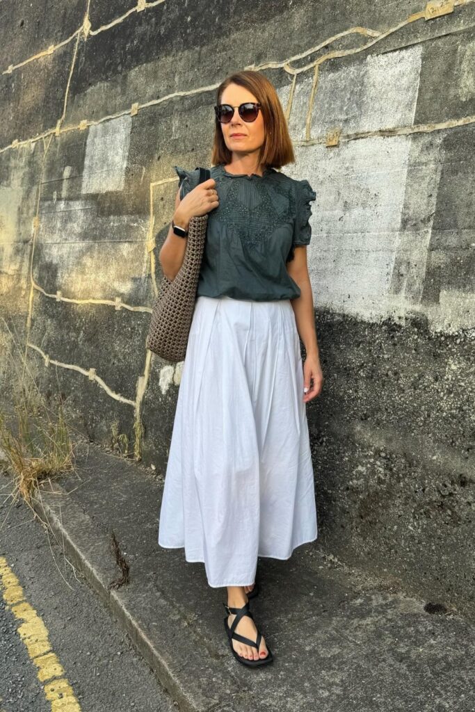 Dark Blouse and White Maxi Skirt