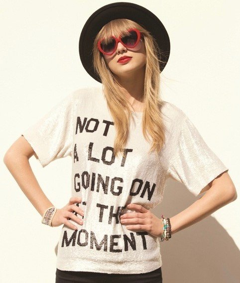 taylor-swift-hairstyles-4a Taylor Swift wearing the infamous "not a lot going on at the moment" shirt.