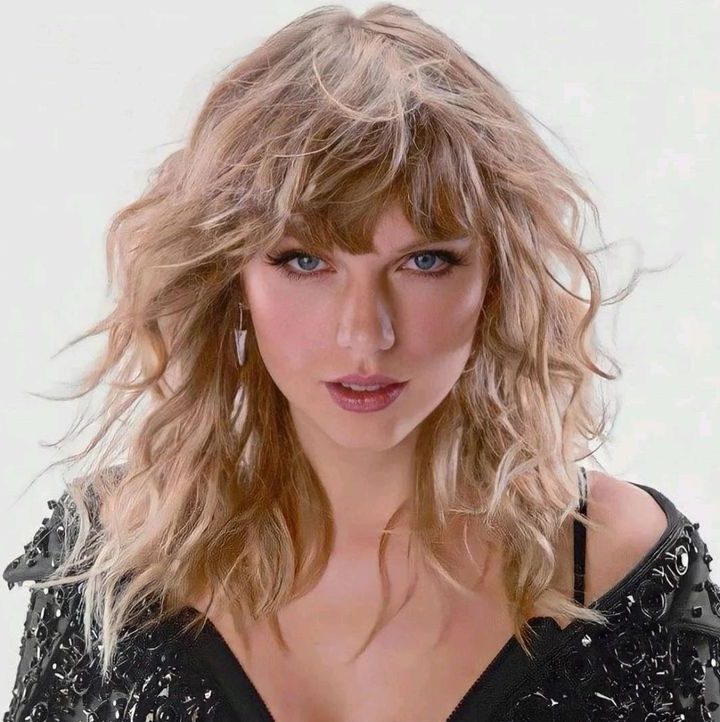 taylor-swift-hairstyles-9-e1716499042401 Taylor Swift Reputation album art.
