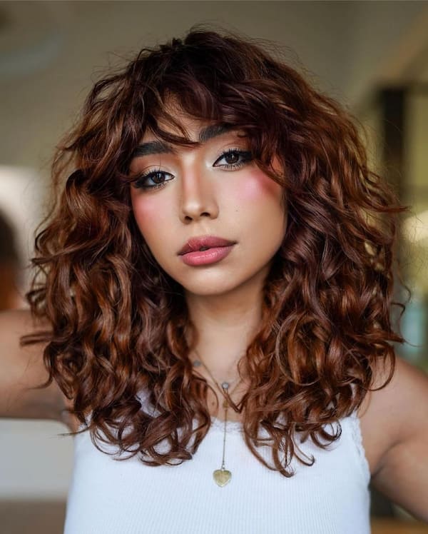 textured-copper-wavy-haircut-with-bangs Textured Copper Wavy Haircut with Bangs