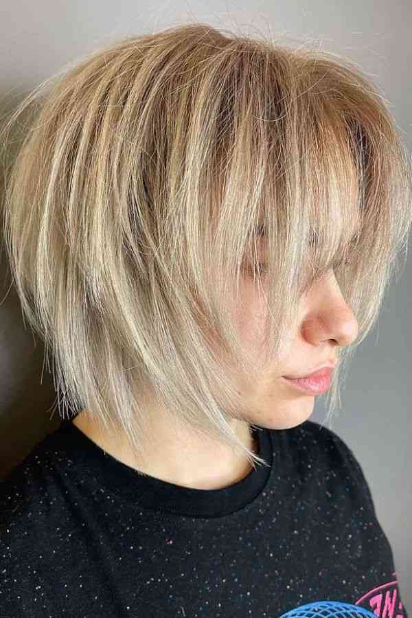 textured-lob-with-face-framing-layers Textured Lob with Face-Framing Layers