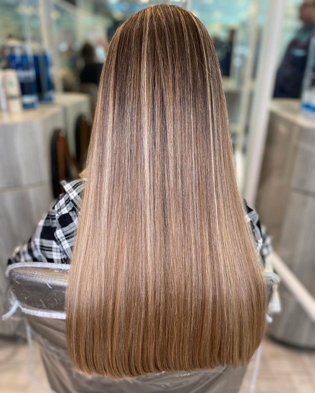 Gorgeous lowlights on long straight hair.