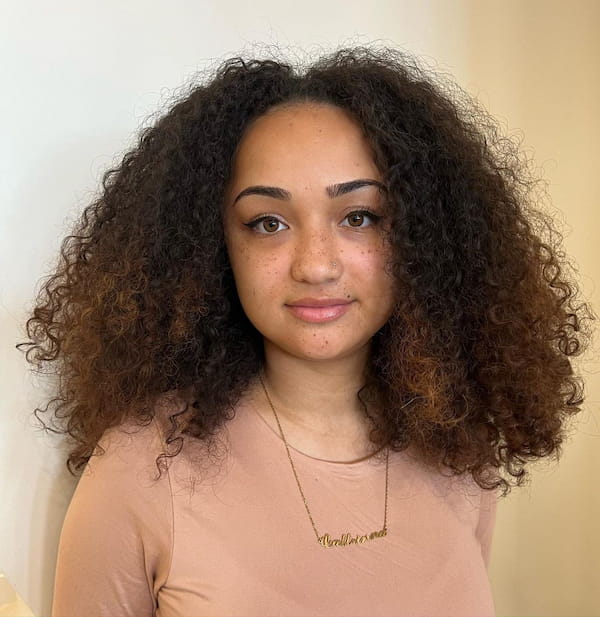 Voluminous Short Curly Hair with Bangs