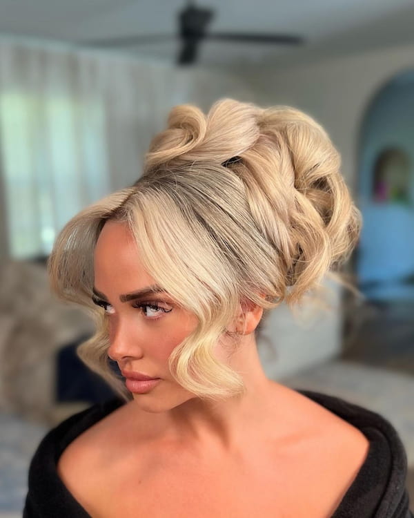 voluminous-updo-with-curtain-bangs Voluminous Updo with Curtain Bangs